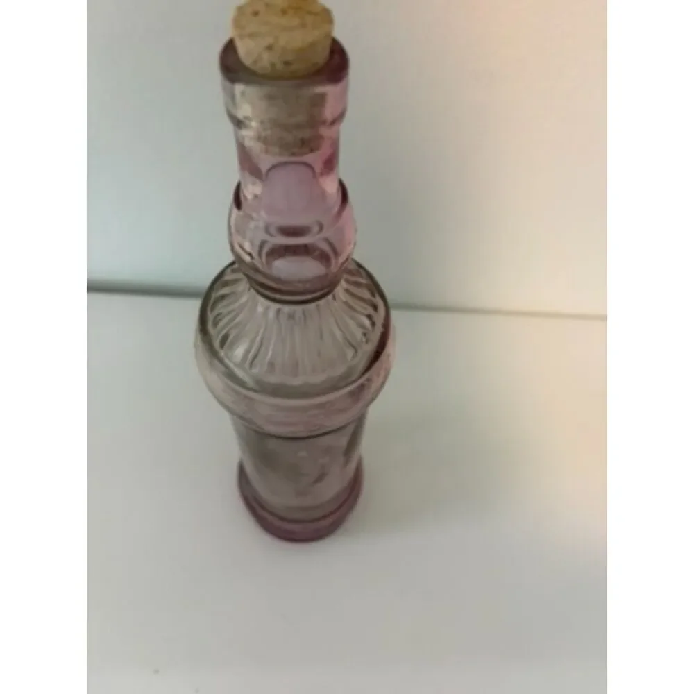 vtg Purple glass bottle with cork stopper ribbed design